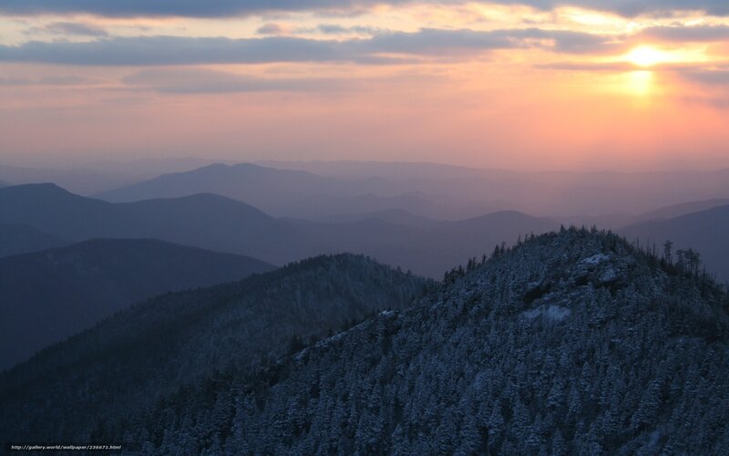 Sunset over snow-covered mountains
