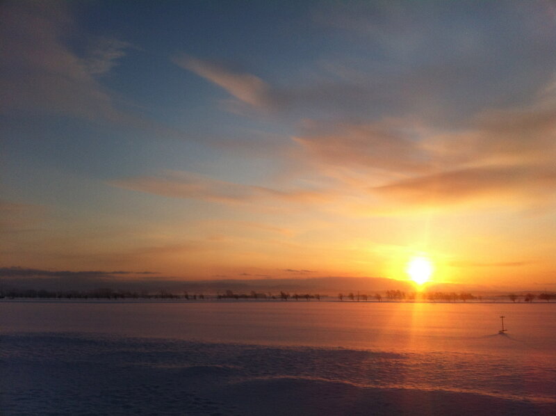 Sunset over Snowy Field — Orange