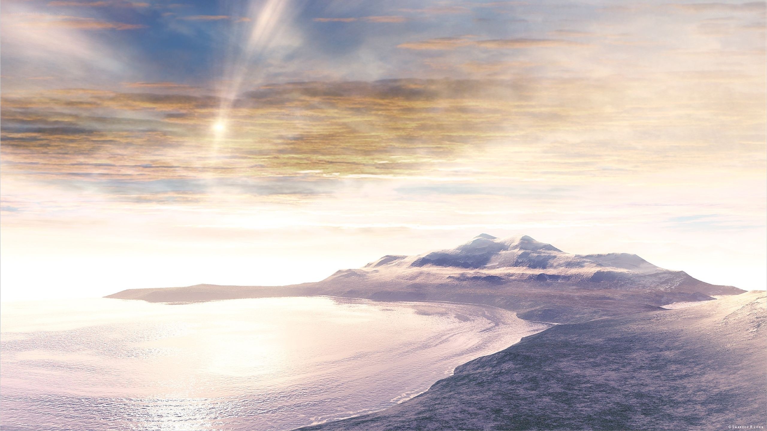 sunset over snowy island