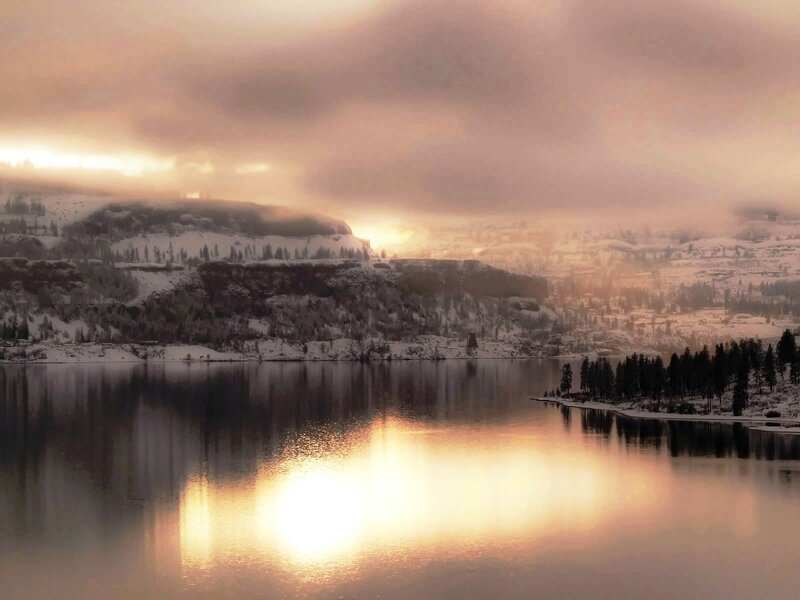 Sunset over snowy lake