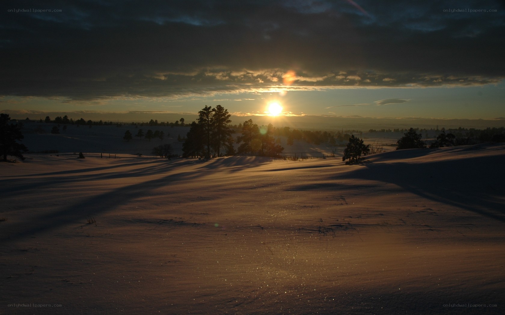 Sunset over snowy landscape