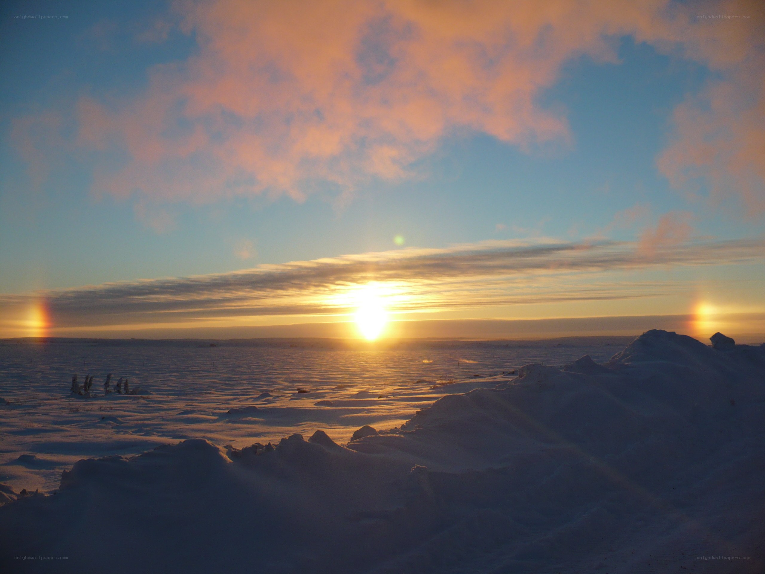 Sunset over snowy landscape