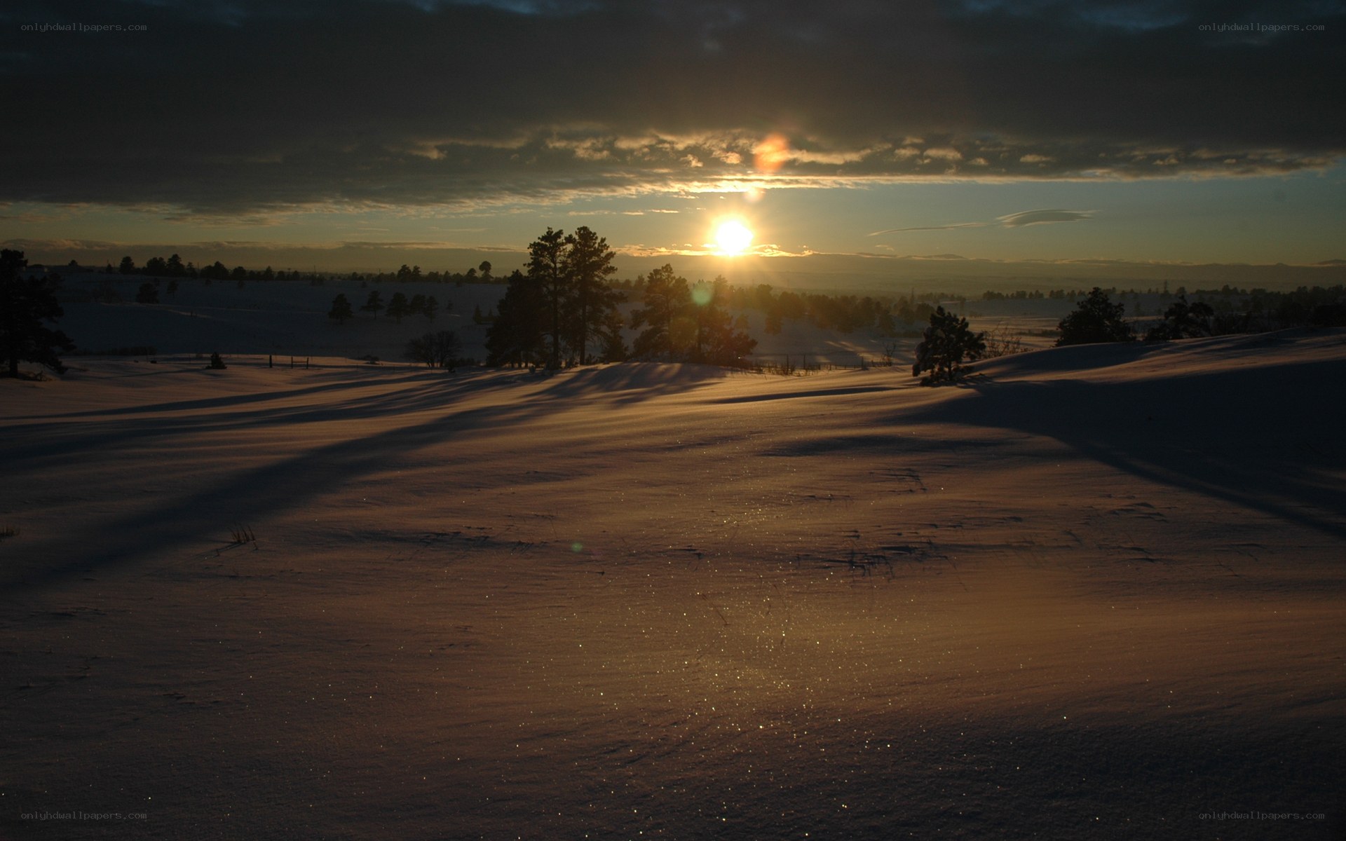 Sunset over snowy landscape