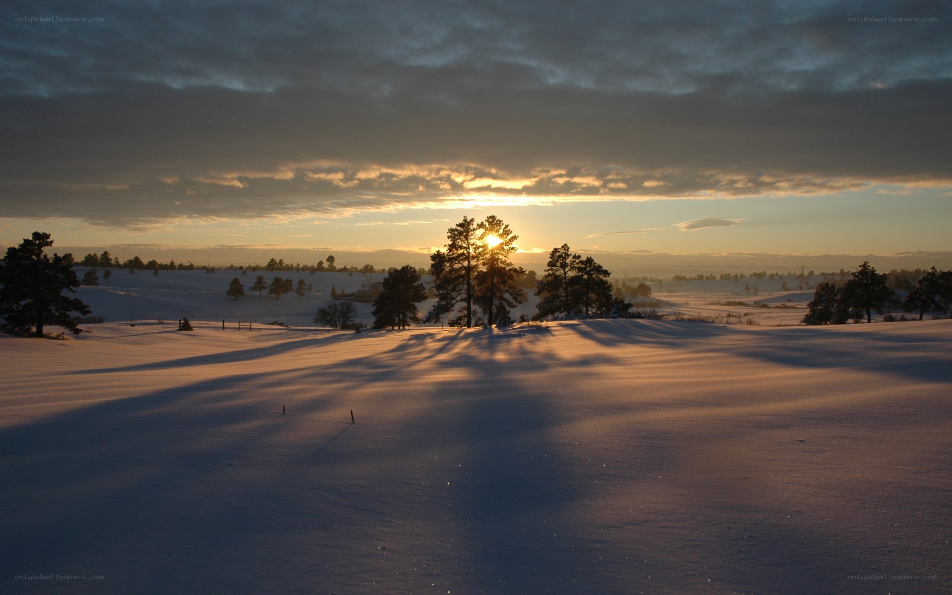 Sunset over snowy landscape