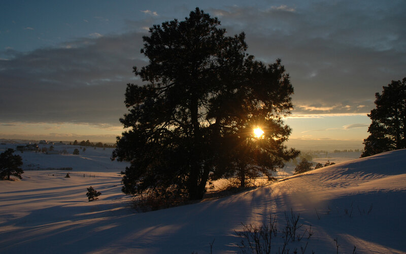 Sunset over snowy landscape
