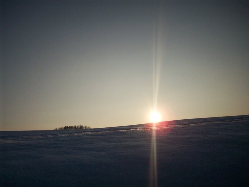 Sunset over snowy landscape