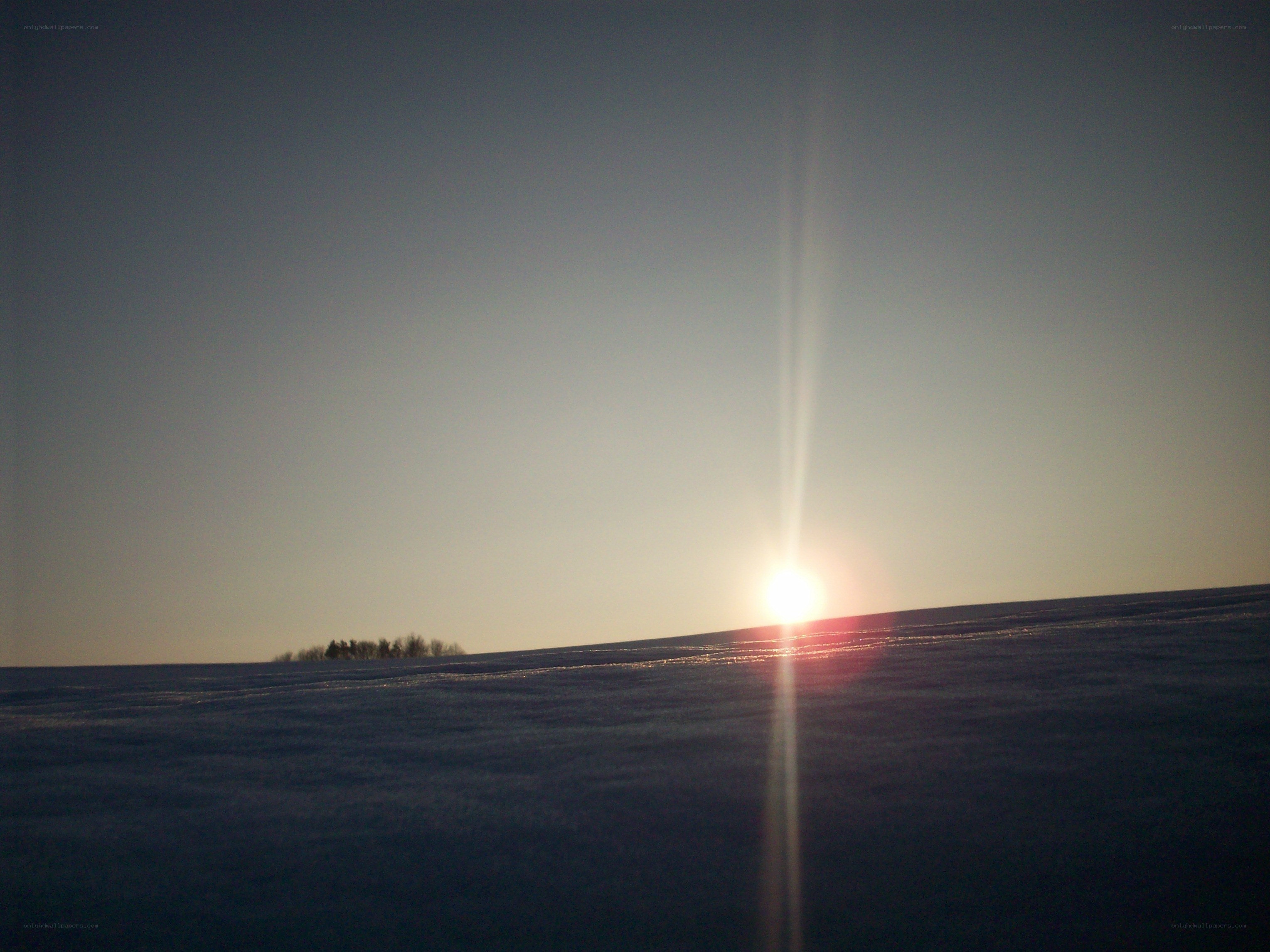 Sunset over snowy landscape