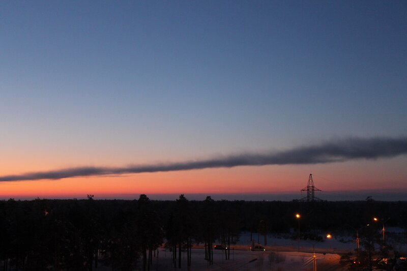 sunset over snowy landscape