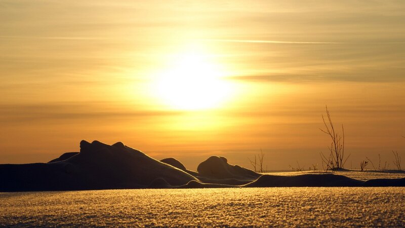 Sunset over snowy landscape
