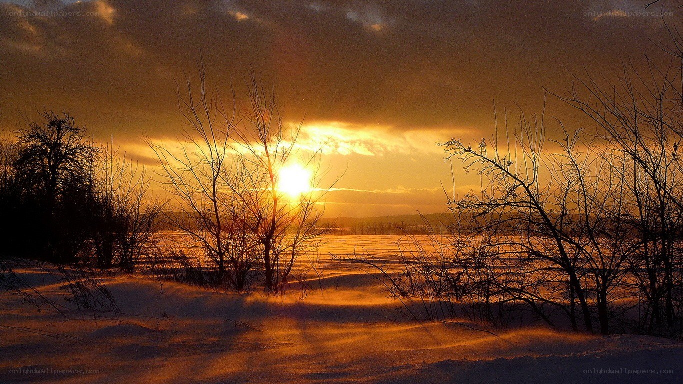 Sunset over snowy landscape