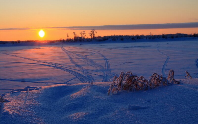 Sunset over snowy landscape