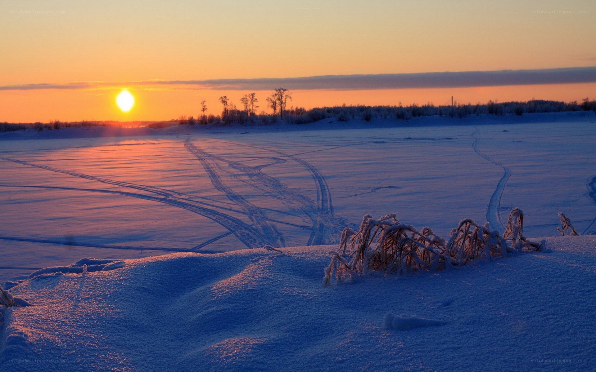 Sunset over snowy landscape