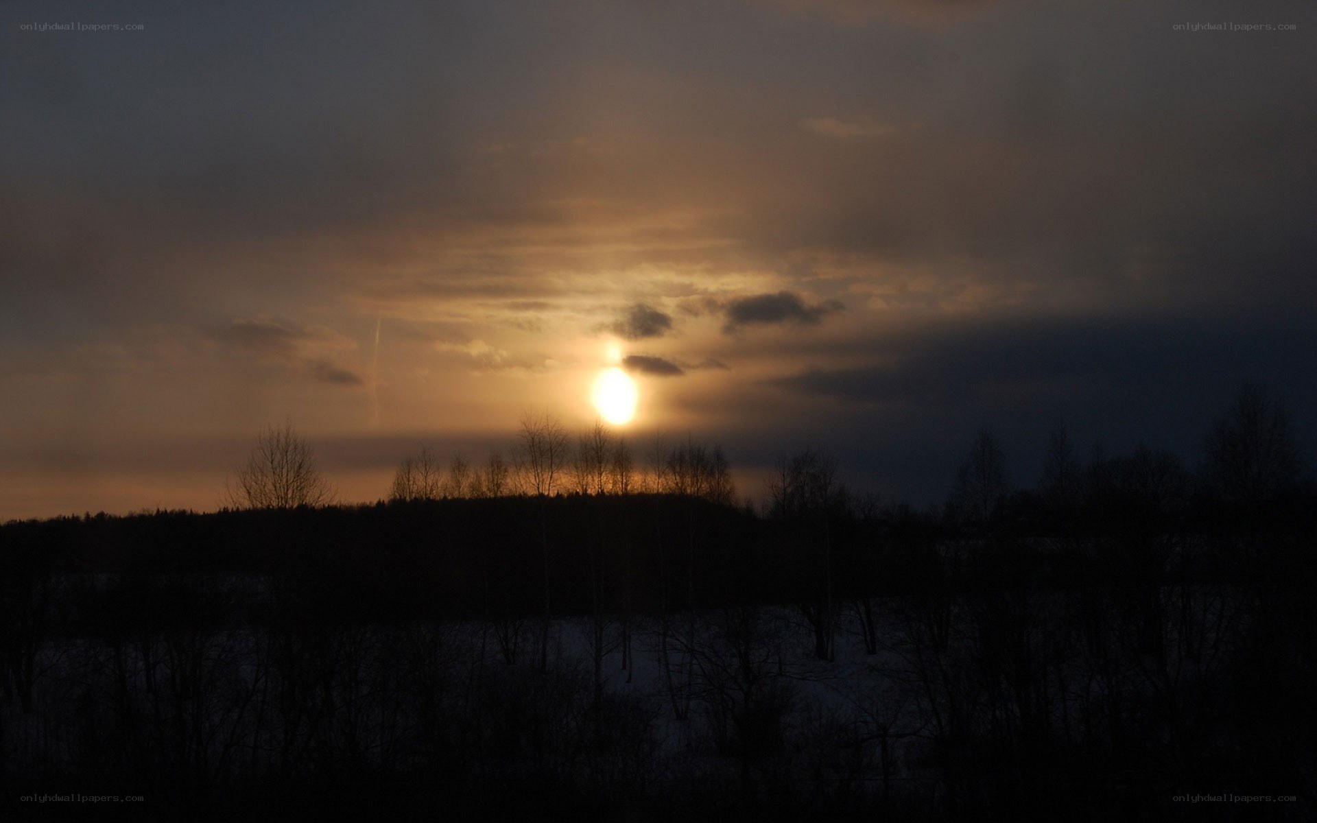 Sunset over snowy landscape