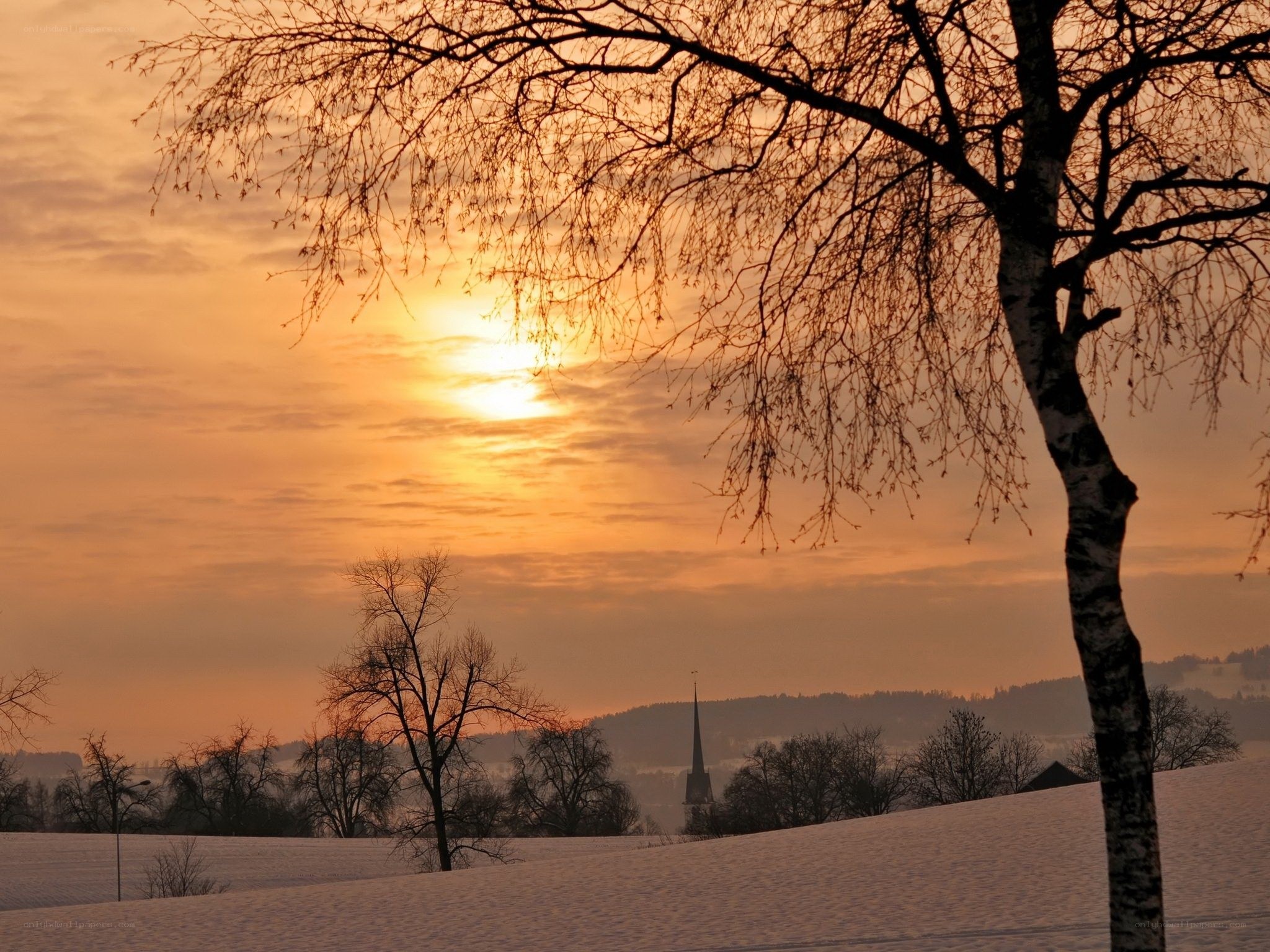 Sunset over snowy landscape