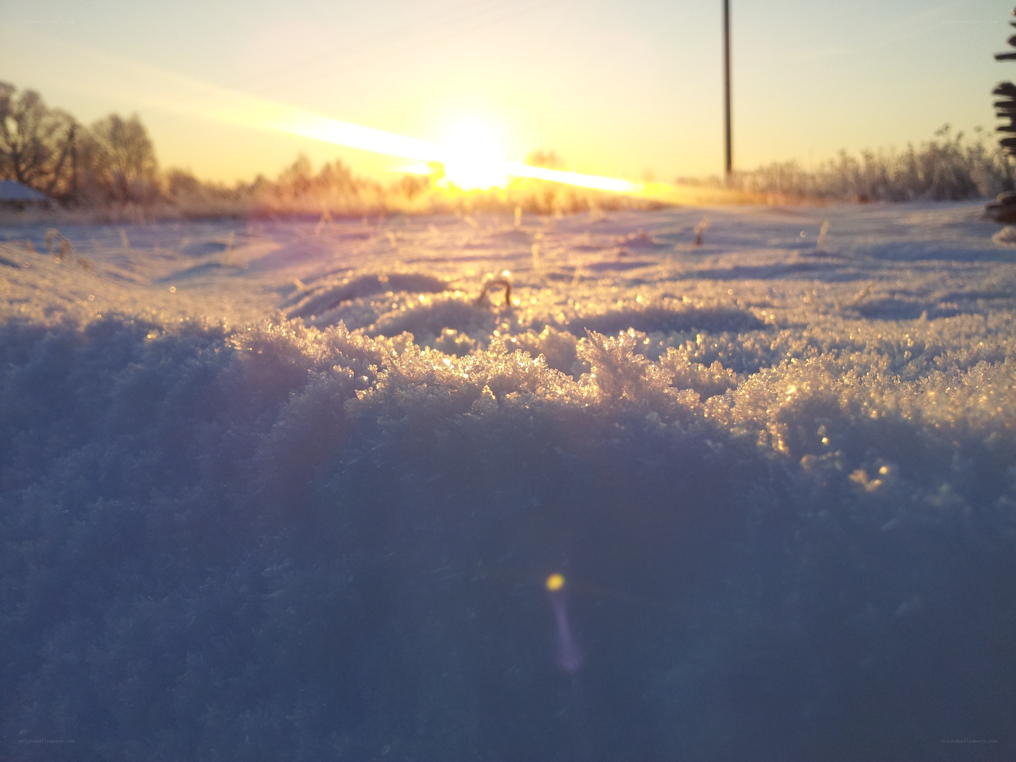 Sunset over snowy landscape