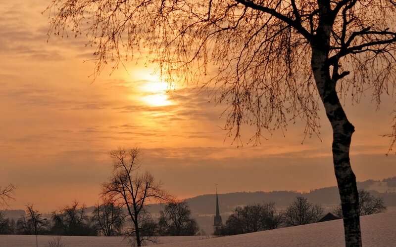 Sunset over snowy landscape