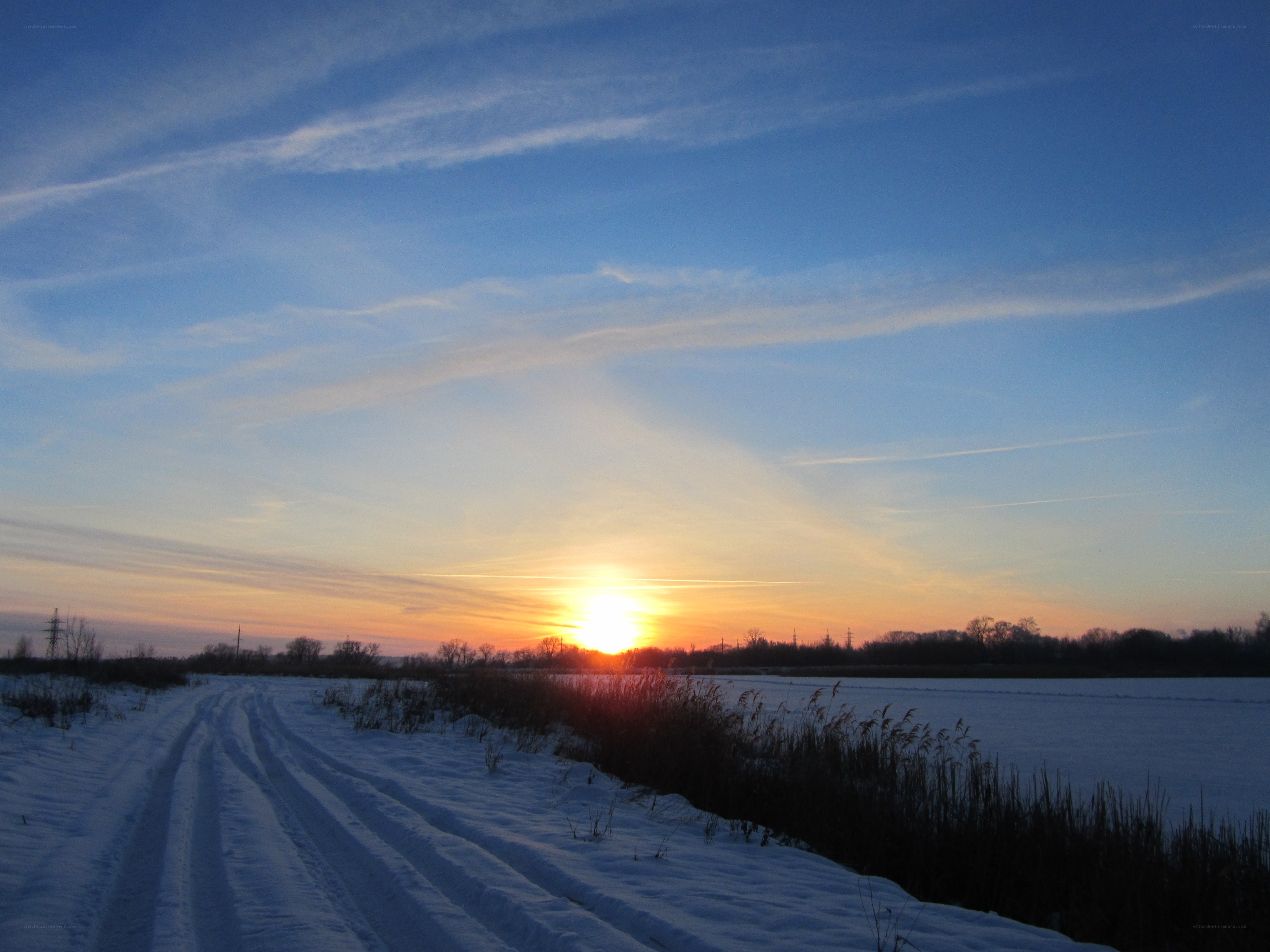 Sunset over snowy landscape