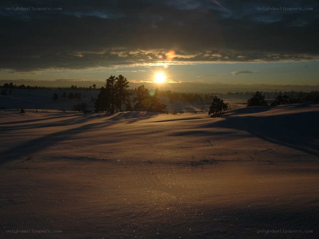 Sunset over snowy landscape