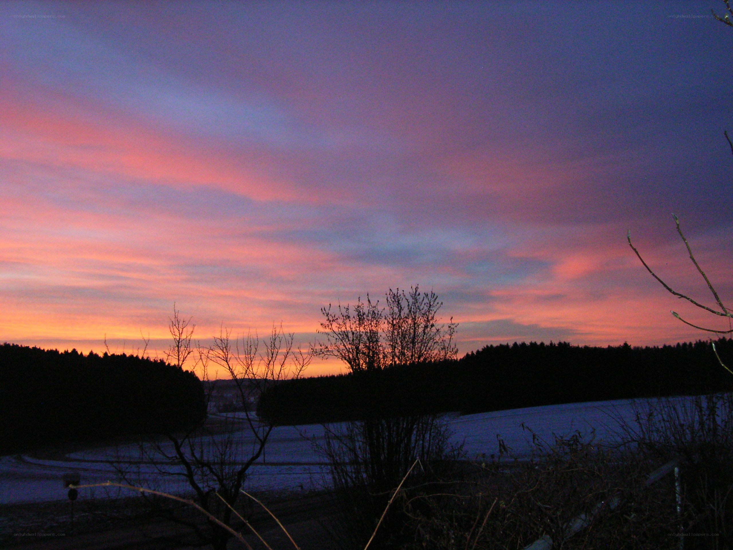 Sunset over snowy landscape