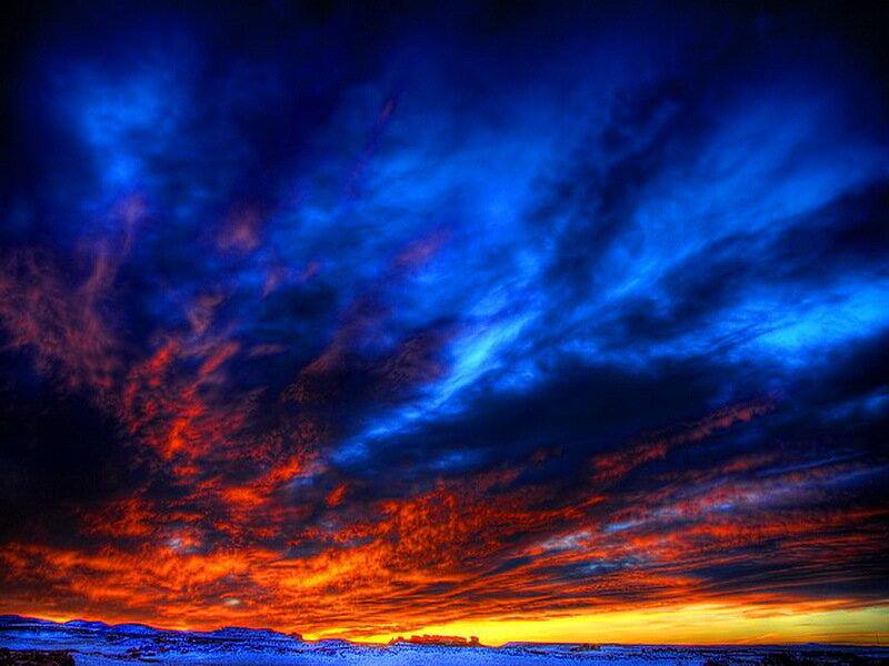 Sunset over Snowy Landscape — Blue