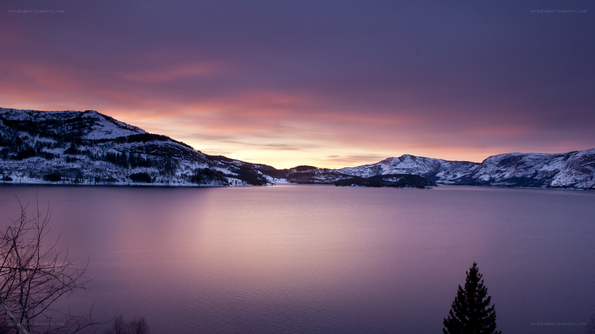 Sunset over snowy mountains