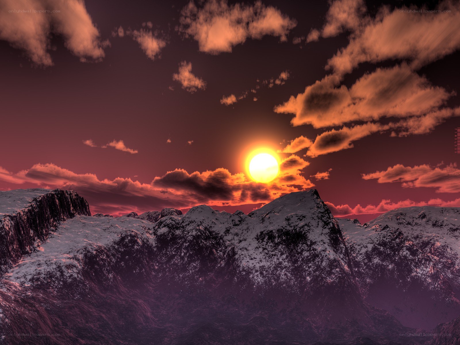 Sunset over snowy mountains
