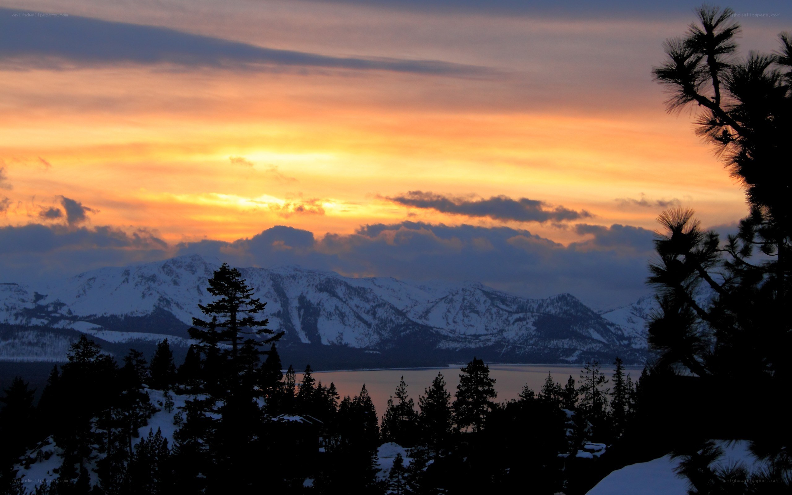 Sunset over snowy mountains