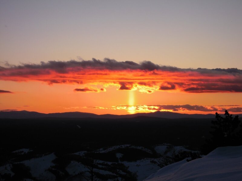 Sunset over snowy mountains