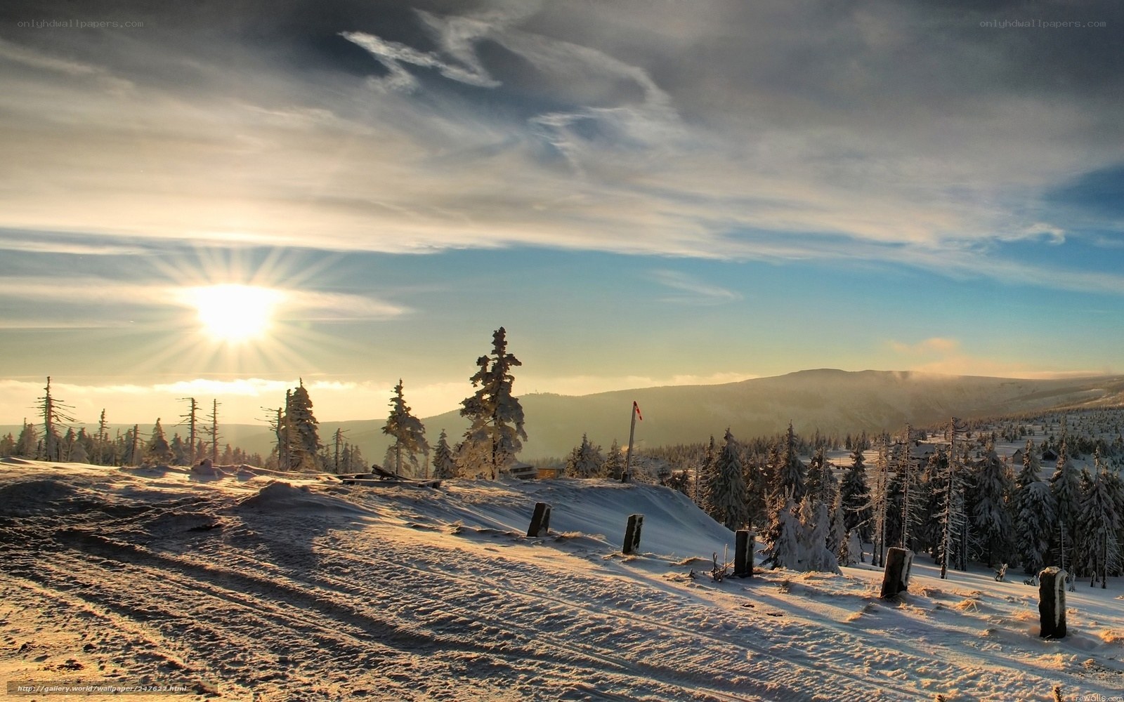 Sunset over snowy mountains