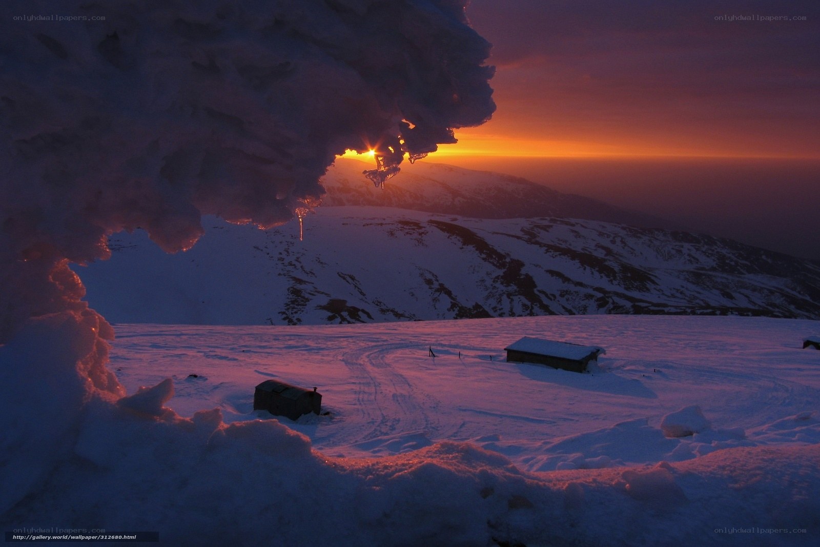 Sunset over snowy mountains