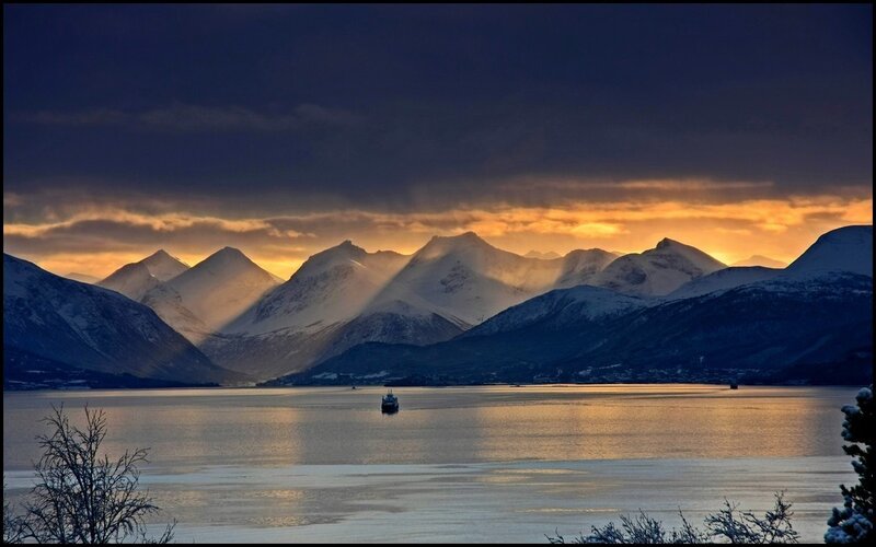 Sunset over snowy mountains