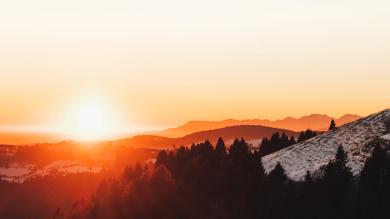 Sunset over Snowy Mountains — Orange, Serene