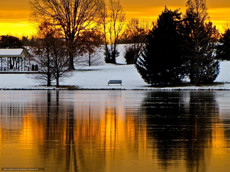 Sunset over snowy park