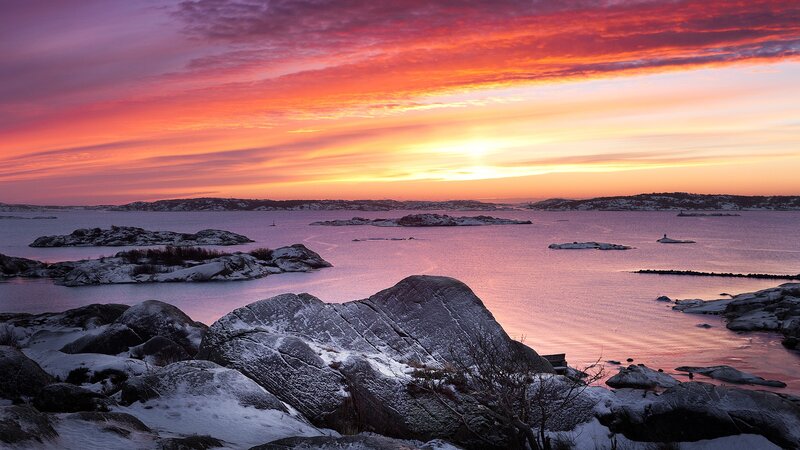 sunset over snowy rocks