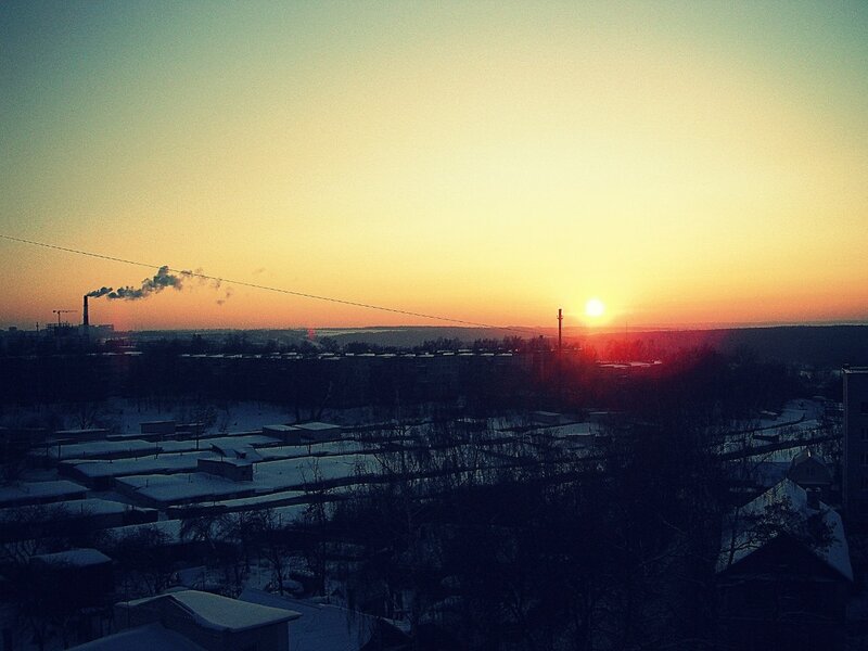 Sunset over snowy town