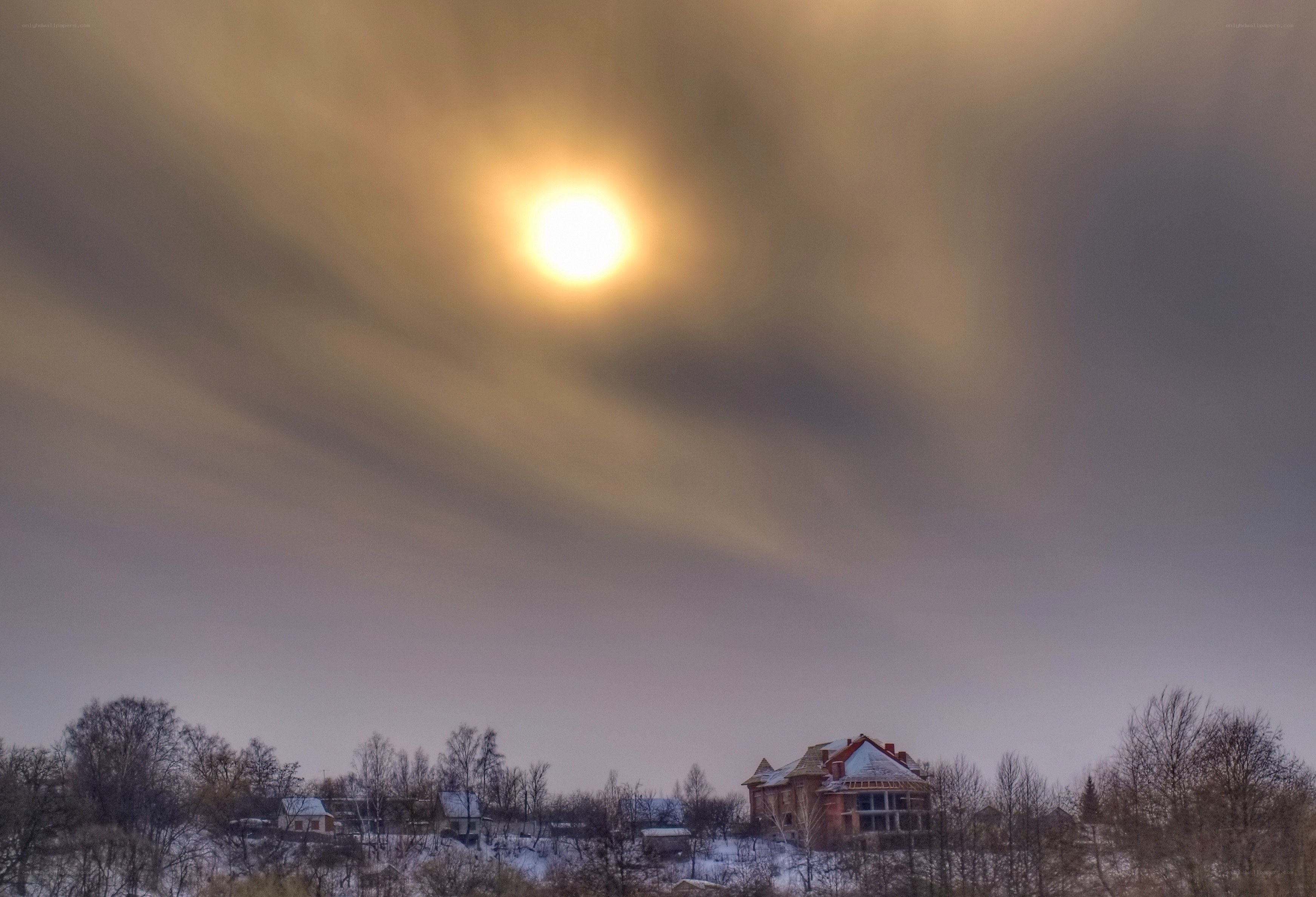 Sunset over snowy village