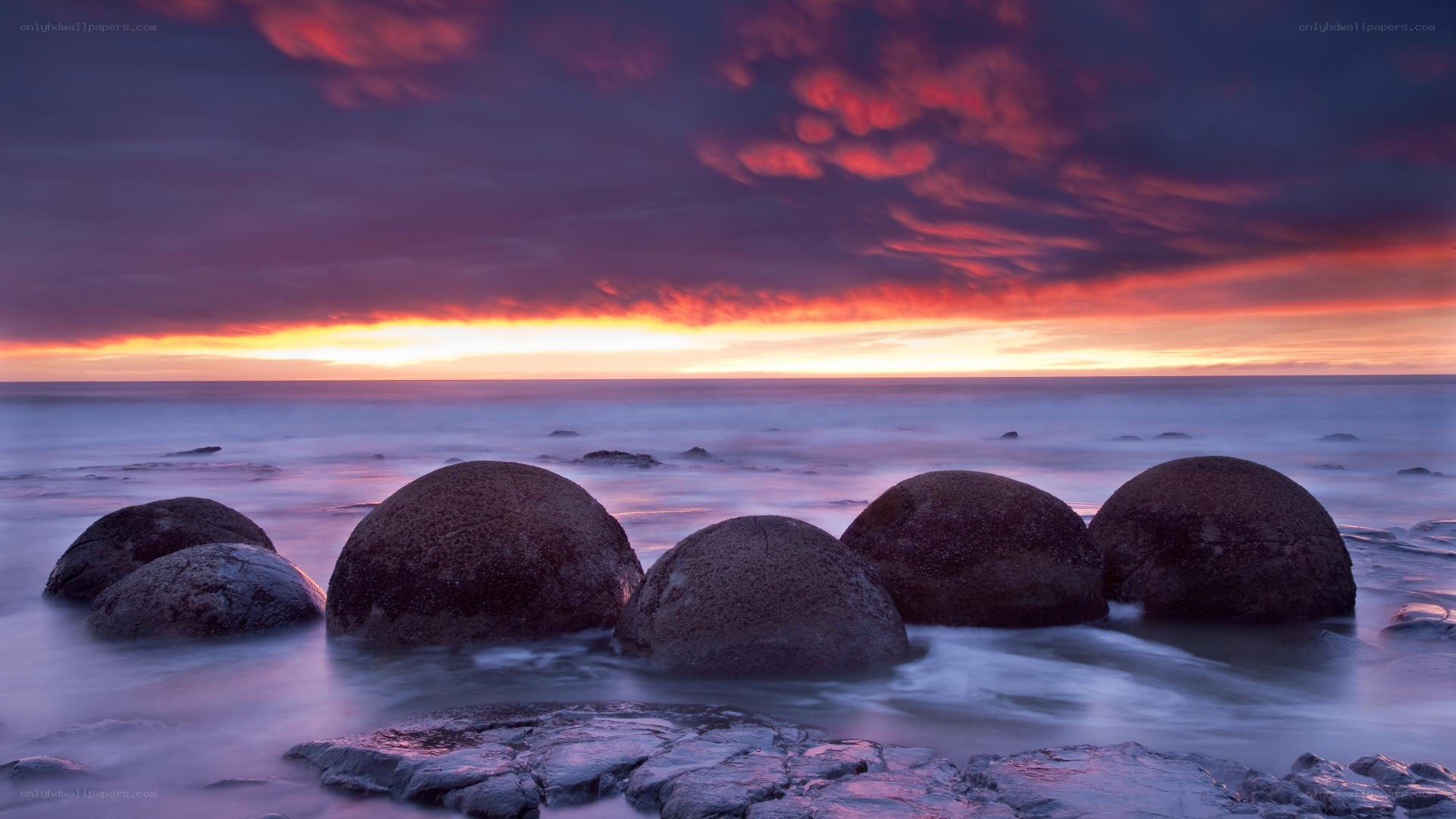Sunset over spherical rocks