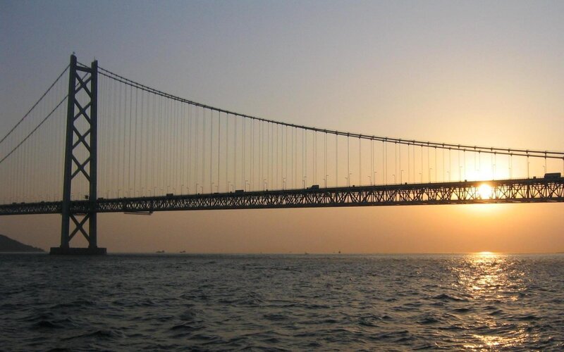 Sunset over Suspension Bridge — Orange, Serene, Photograph, Sea