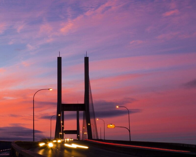 Sunset over Suspension Bridge — Purple, Dramatic