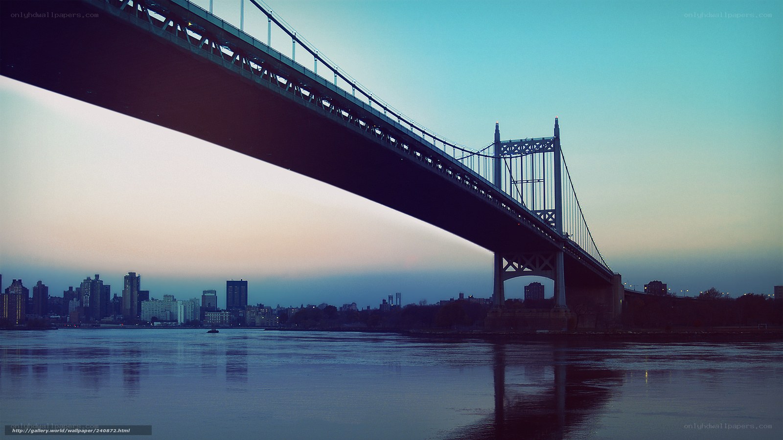 sunset over suspension bridge