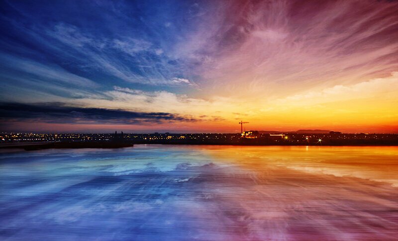 sunset over the city harbor