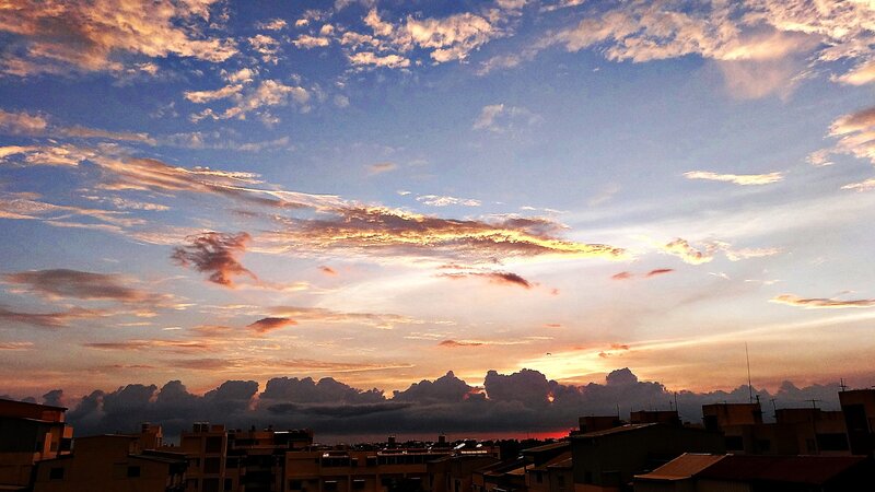 Sunset over the city rooftops