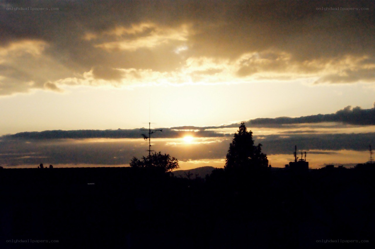 Sunset over the city skyline