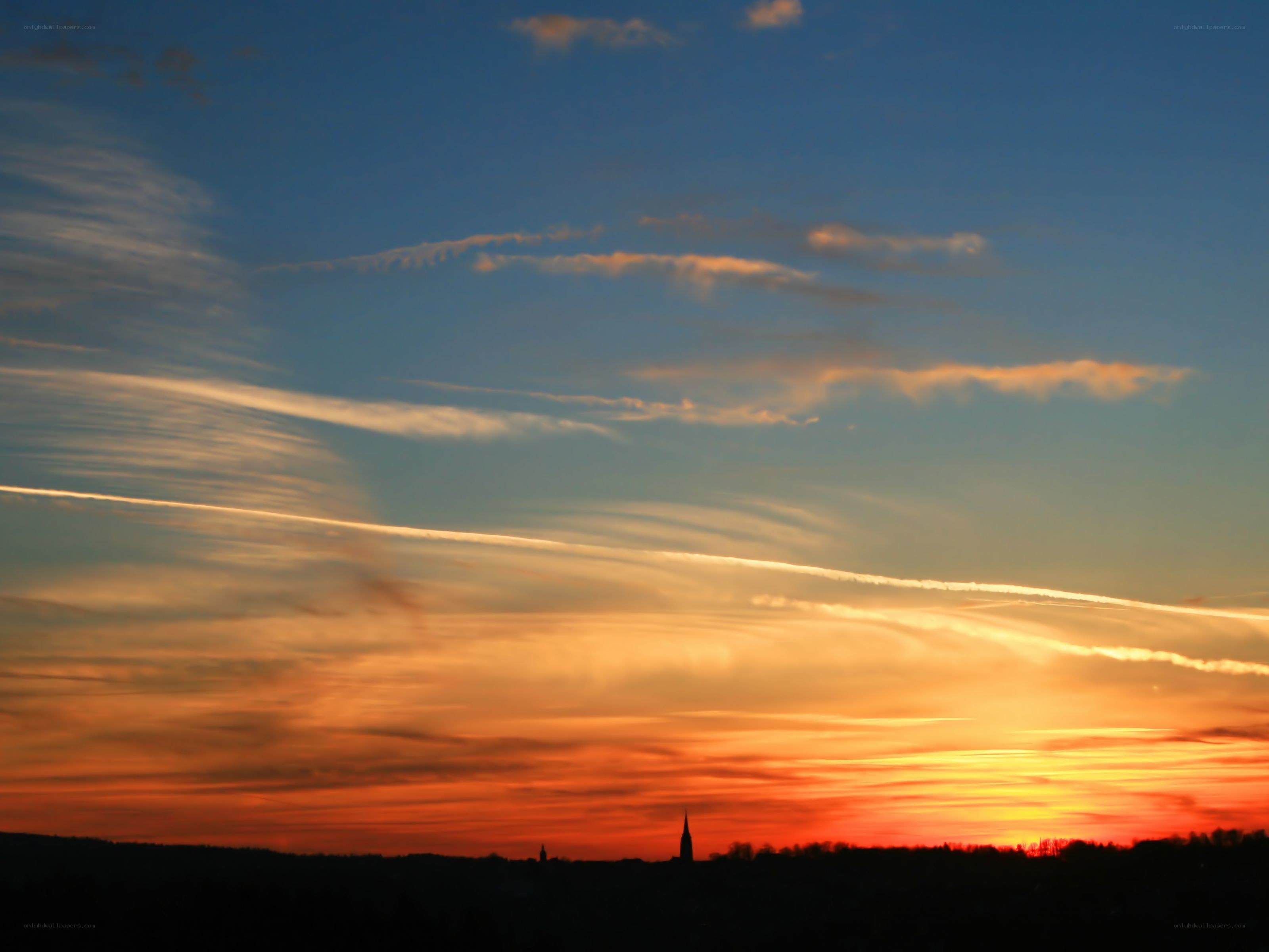 sunset over the city skyline