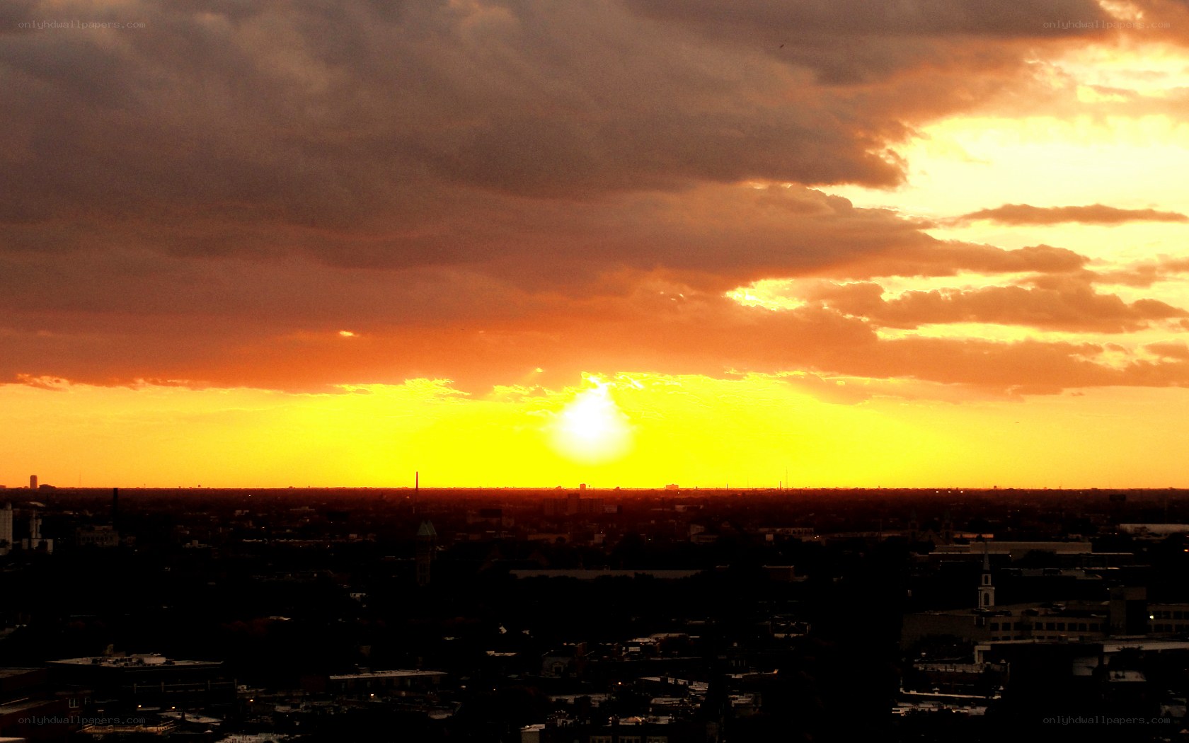 Sunset over the city skyline