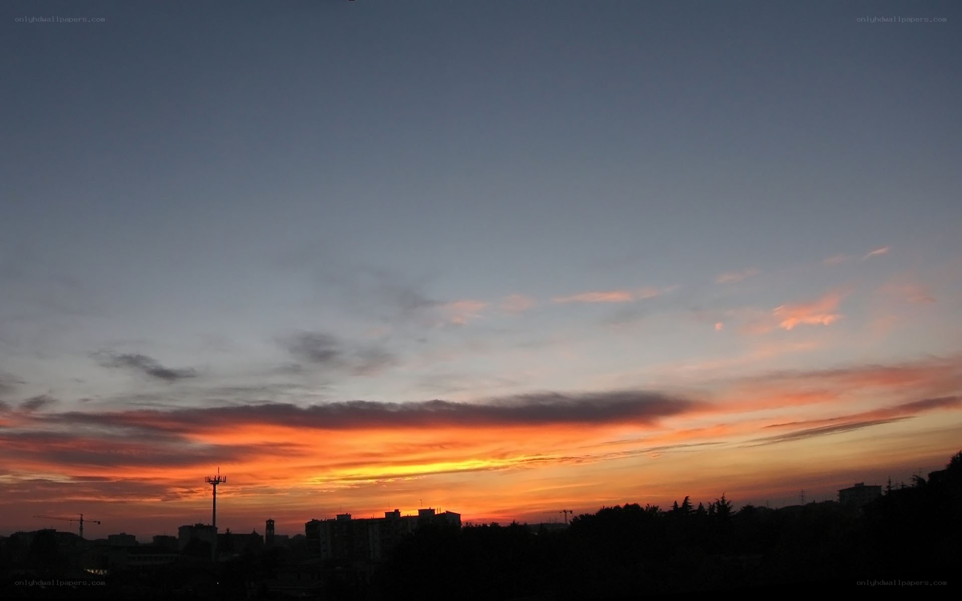 Sunset over the city skyline
