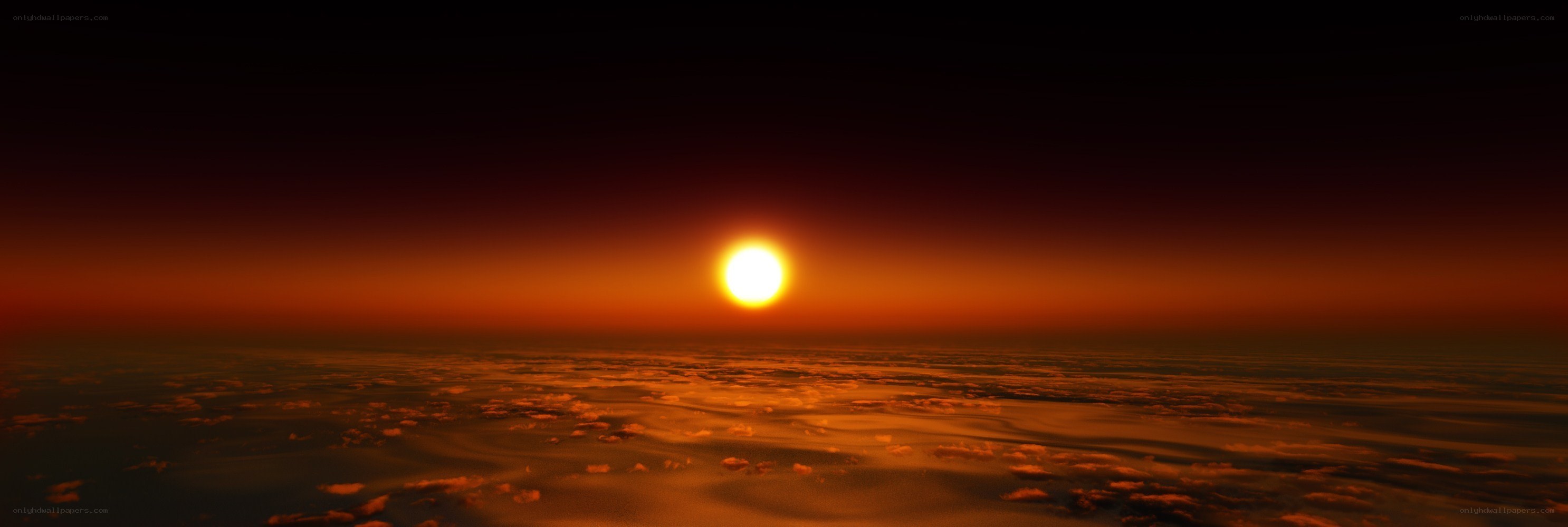 Sunset over the clouds