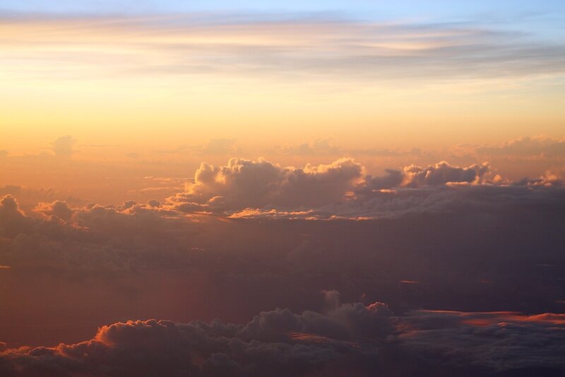 Sunset over the clouds
