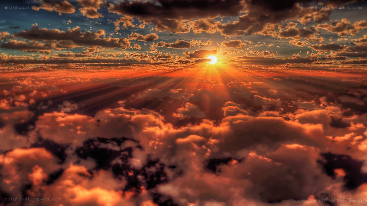 Sunset over the clouds
