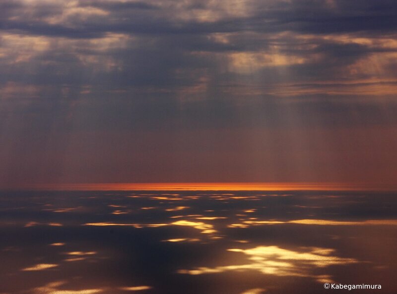 Sunset over the clouds